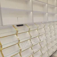 طبقاتی ابشاری در قفسه اجیل تخمه عطار استند اماده ل