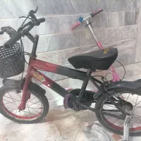 یک عدد دوچرخه 12 پسرونه ویک عدد اسکوتر