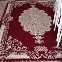 یک جفت قالی ۱۲ متری و مقداری مانتو و کفش