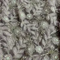 پارچه مجلسی گل برجسته سنگدوزی شده