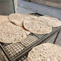 نون فروش خانوم.درنانوایی