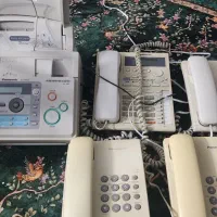 یک دستگاه تلفن فکس و 4گوشی تلفن پاناسونیک