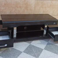 میز تلوزیون کم کار و کاملا سالم