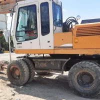 اجاره بیل مکانیکی لاستیکی باپیکور