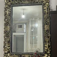 اینه دور چوب