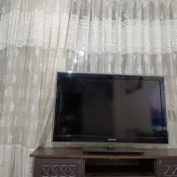 تلویزیون سوخته و میزش