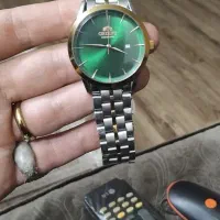 ساعت اورینت اصل وجیشاک