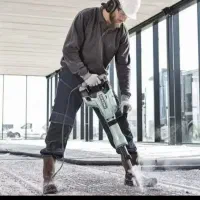 تخریب کار کنگان دیوار  و شیار زنی  و تخلیه مصالح