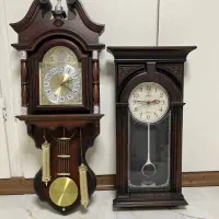 دو عدد ساعت دیواری تاندول دار