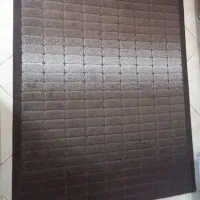 قالیچه قهوه‌ای سوخته