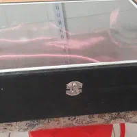یک عدد صندوقچه به همراه یک عدد قاب عکس