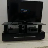 میز تلویزیون مشکی شیشه و چوب