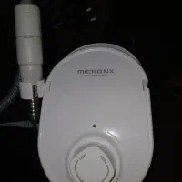 دستگاه کاشت ناخن