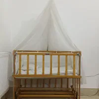 گهواره تخت کنار مادری