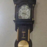 ساعت دیواری آونگ دار