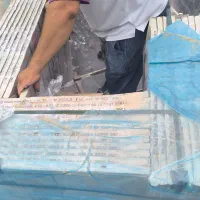 کارگر انبار کاشی اتباع