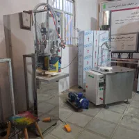 دستگاه پرکن مایع توزینی اینورتردار بسته بند مایعات