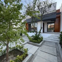 باغچه مدرن187زمین/94بنا/2خوابه/شهرک راشا/سنددار