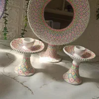 اینه وشمعدان سفالی