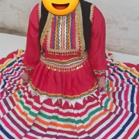 لباس محلی.|لباس|کلاچای, |دیوار