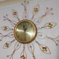 ساعت دیواری طرح خورشیدی