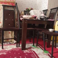 میز غذاخوری چوبی با صندلی فلزی پنج عددی