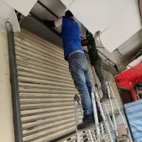 تعمیر کرکره برقی جک درریلی اپراتور در شیشه ای برقی