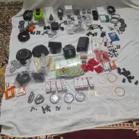 تعدادی قطعات یدکی علفزن وموتور آب و برق و تیغ ۴۰