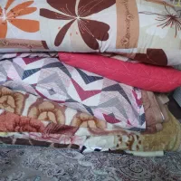 تشک و پتو تمیز قدیمی زیاد استفاده نشده