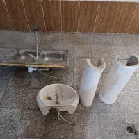 کالسکه بچه.وسینگ ظرفشوربه همراه شیر آب .و دستشور
