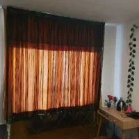 پرده توری قهوه ای گیپوری همراه با پشت پرده ای