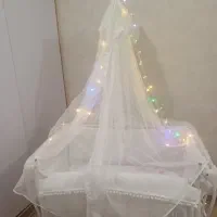 گهواره کنار تخت مادر