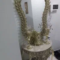 اینه شمعدان وساعت