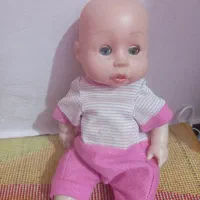 عروسک نوزاد موزیکال همراه گهواره