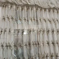 پرده و پفکی و چوب پرده