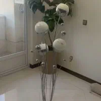 آباژور ایستاده کنار سالنی 4 شعله