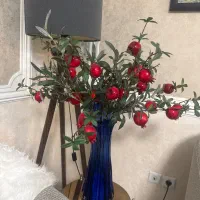 گلدان و گل مصنوعی