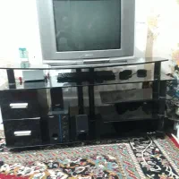 میزتلوزیون‌شیشه‌ای‌باتلوزیون‌شارپ‌۲۱اینج‌صفحه‌تخت