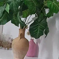 گل مصنوعی وگلدان سفالی کوزه