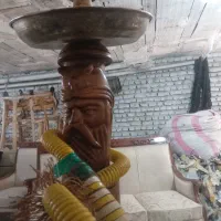 یک عدد قلیان با تنه چوبی تمام گردو رخ