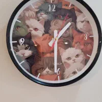 ساعت دیواری و ماگ و زیر لیوانی گربه ای