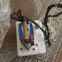 اتو مخزن داره یک لیتری ، ترک