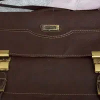 کیف اداری چرم گاوی طبیعی آکبندودوتاهم کارکرده دارم