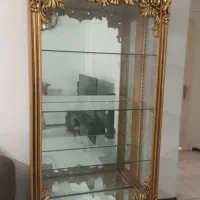 بوفه چوبی رنگ طلایی در حد نو با منبت کاری