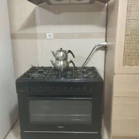 اجاق گاز پنج شعله فردار  برقی با پنجره چدن