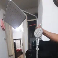 علم دوش همراه شیر