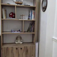 یک عدد کتابخانه. قد ۱۸۰.طول ۸۰