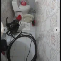 چاه بازکنی کن تخلیه فاضلاب فنرزدن فنرزنی زن لوله