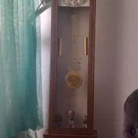ساعت ایستاده و لباس تکواندو