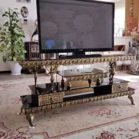 تلویزیون سامسونگ به همراه میز تلویزیون برنز